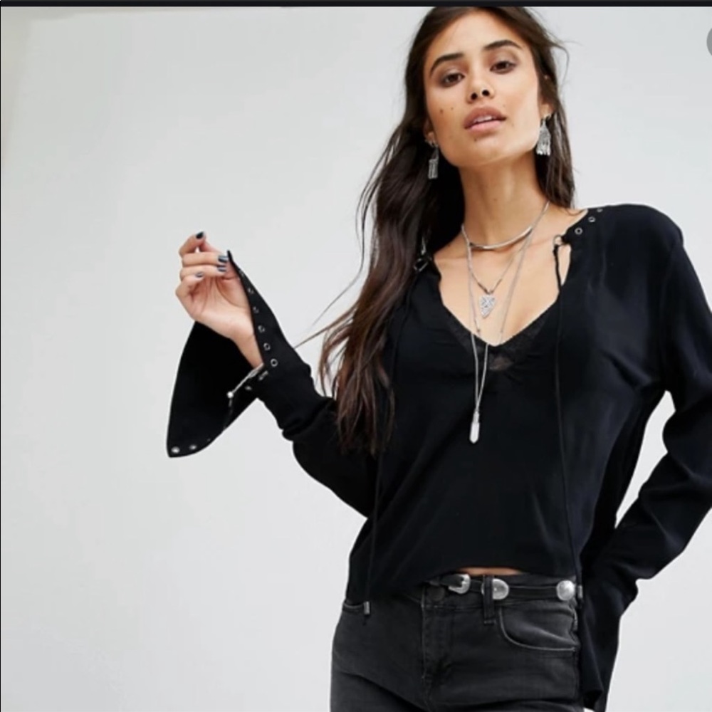 Free People black flare sleeve blouse.